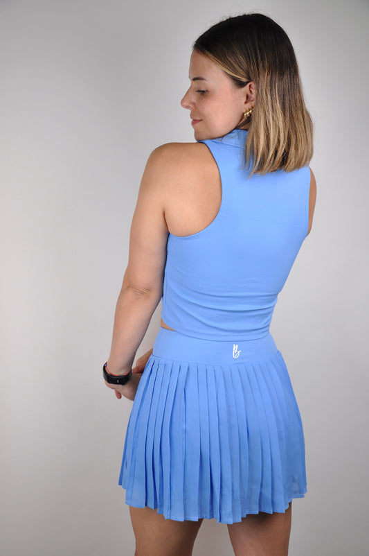 Conjunto top cuello y falda plisada