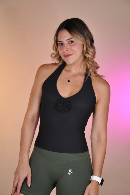 Top backless con flor