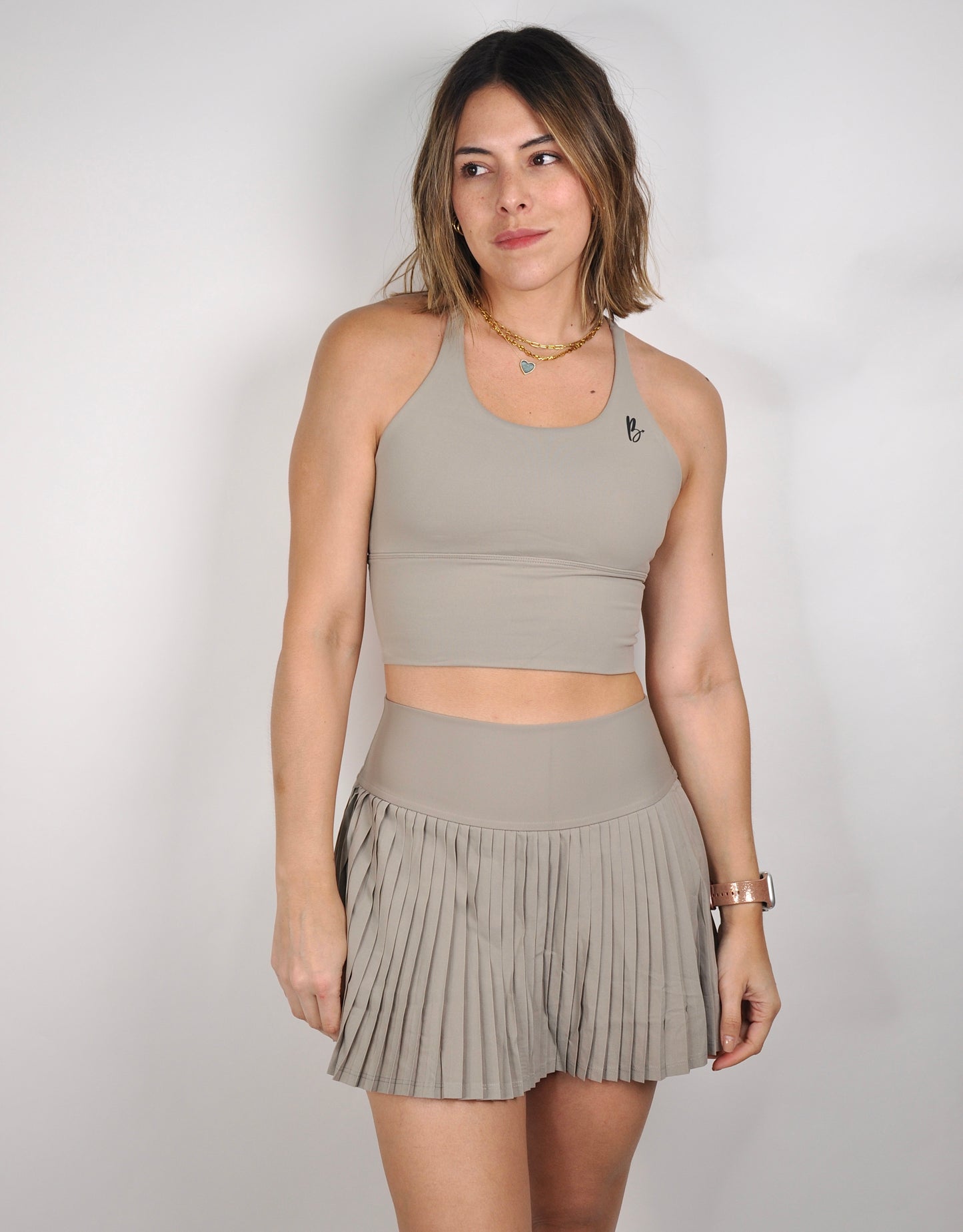 Conjunto top backless y falda plisada