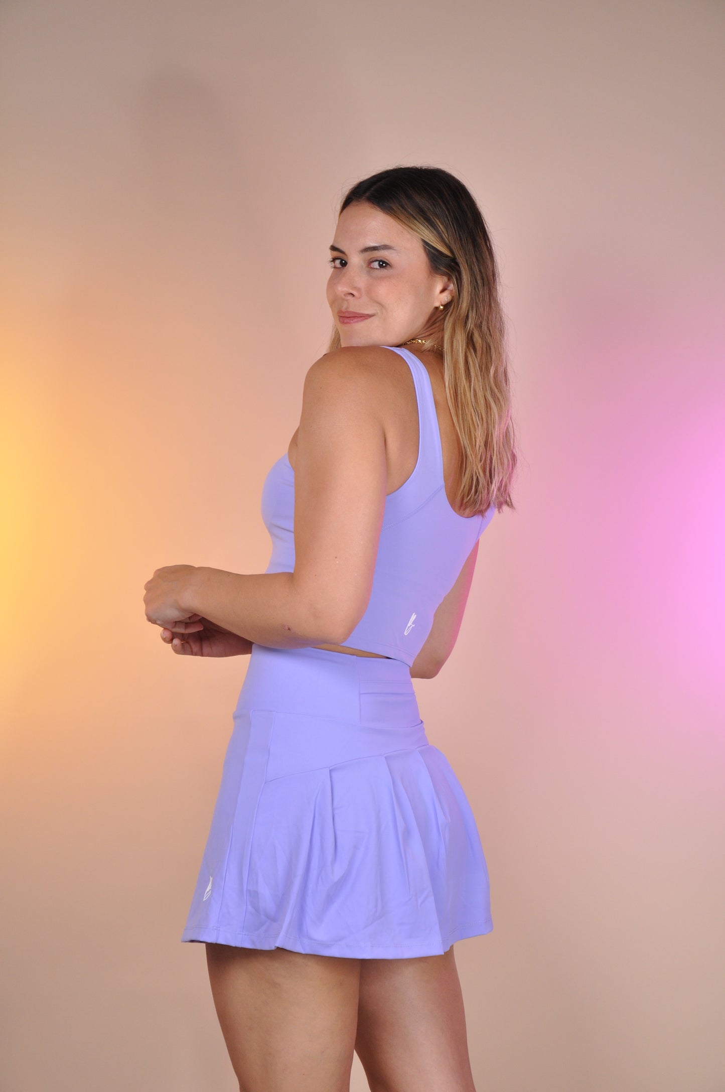 Conjunto curved y falda semi plisada