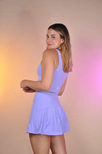 Conjunto curved y falda semi plisada