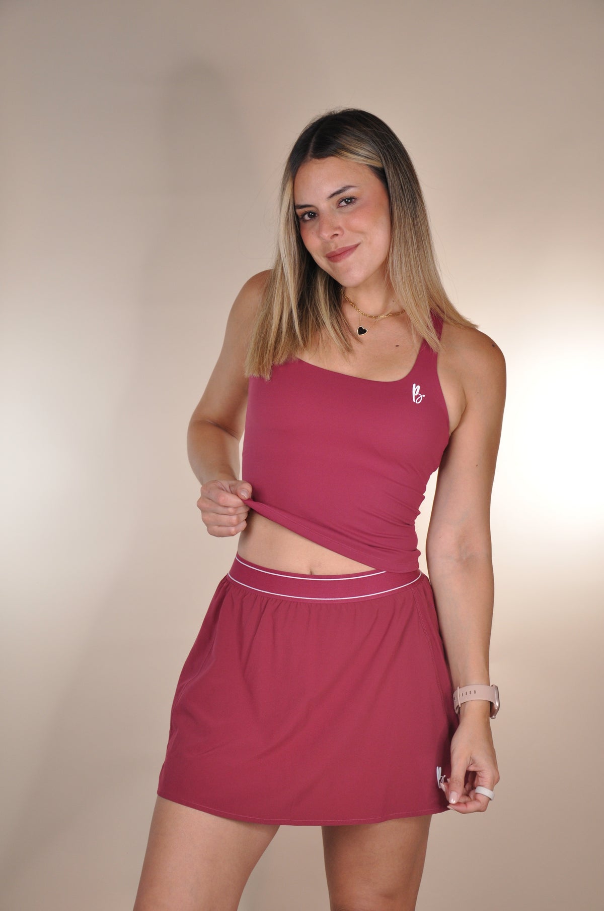 Conjunto top largo y falda con borde