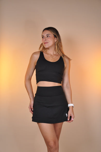 Conjunto curved y falda semi plisada