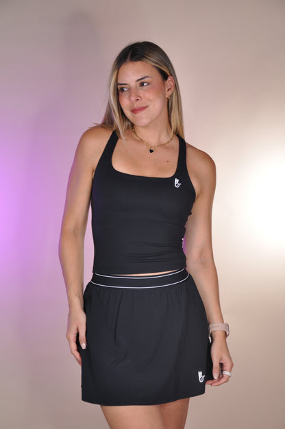 Conjunto top largo y falda con borde