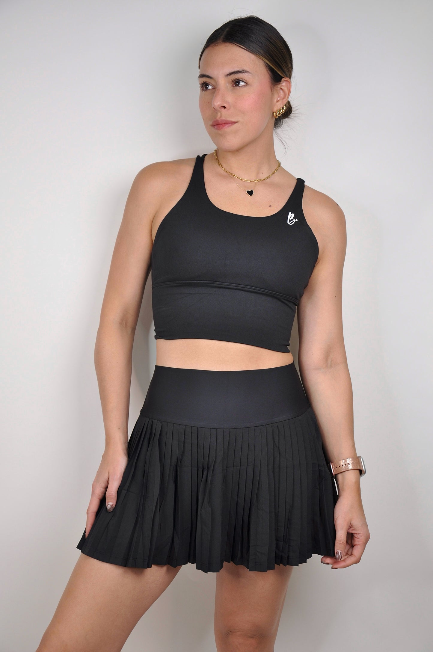 Conjunto top backless y falda plisada