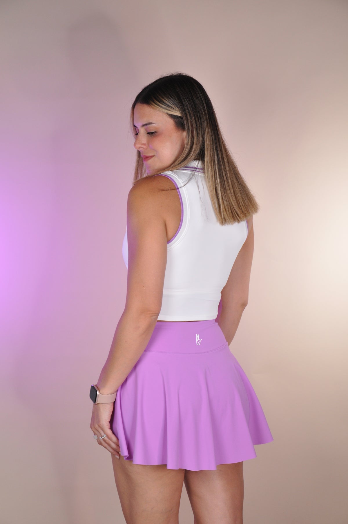 Conjunto top con cuello y falda asimetrica