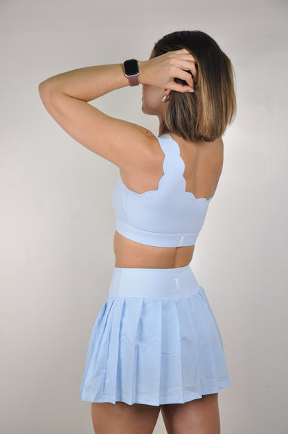 Conjunto top de lado scalloped y falda plisada